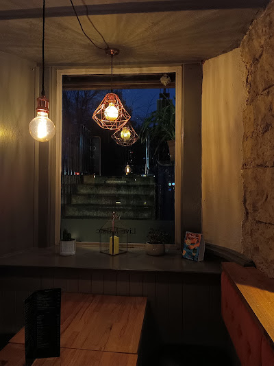 Vibrant interior of the Best Bar in Edinburgh, Tap Trap Indian Restaurant & Bar
