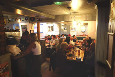 Crowded scene at Tap Trap, a top Indian street food destination in Edinburgh.
